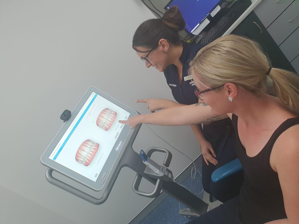 Dental Hygienist Showing the Parts that the Invisalign with Correct | Invisalign on Toowoomba
